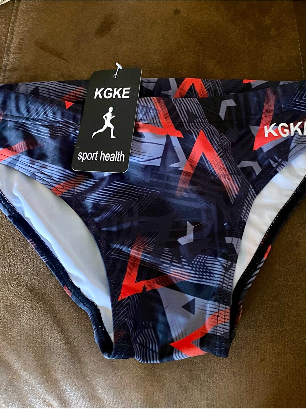 KGKE Sport Health Men's Swim Brief - sz S, Black with Red & Gray Geometric Print